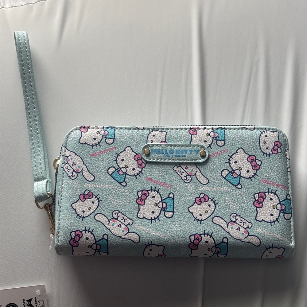 Hello Kitty and Cinnamonroll Light Blue Wristlet with Pink Accents | SANRIO